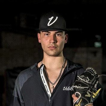 Daniel in the cage during off-season velocity training